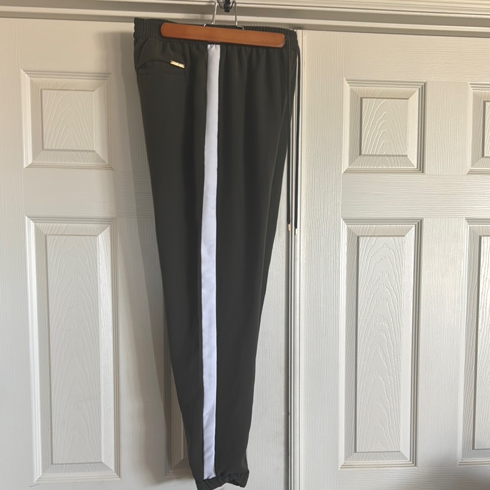 Michael Kors Women’s Green and White Track Pants. Dressy casual.
